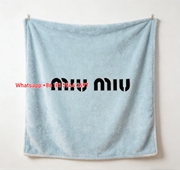 Miu Miu Minimalist Logo Light Blue Flannel Throw Blanket Miu Miu Brand Name Printed Sofa Blanket IMG_0370
